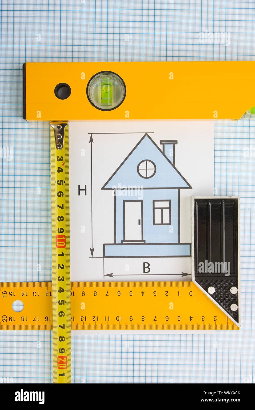 Drawing At Home With Construction Tools On A Background Of Graph Paper Stock Photo Alamy