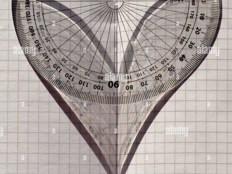 Love Maths A Protractor In Sunlight On Folded Graph Paper The Shadow Depicting A Heart Stock Photo Alamy